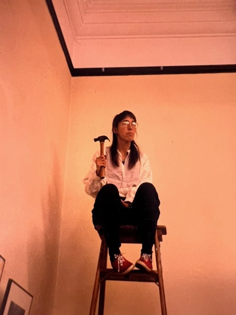 Rochelle on a ladder