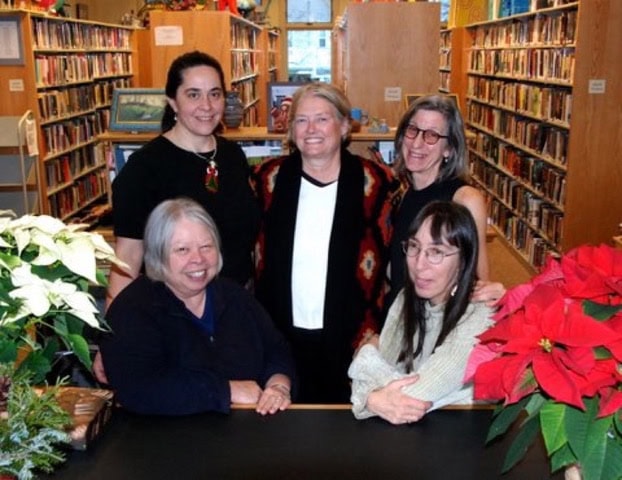 Library staff behind the desk
