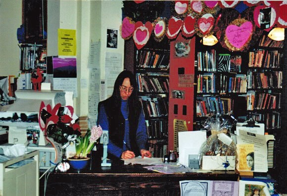 Rochelle behind the old circ desk