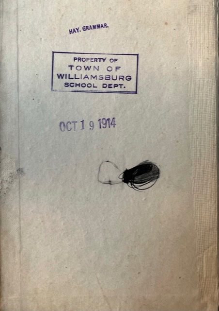 a page stamped with "property of town of williamsburg school dept.," dated oct 19, 1914, with "hay. grammar." at the top and a scribble in black ink.
