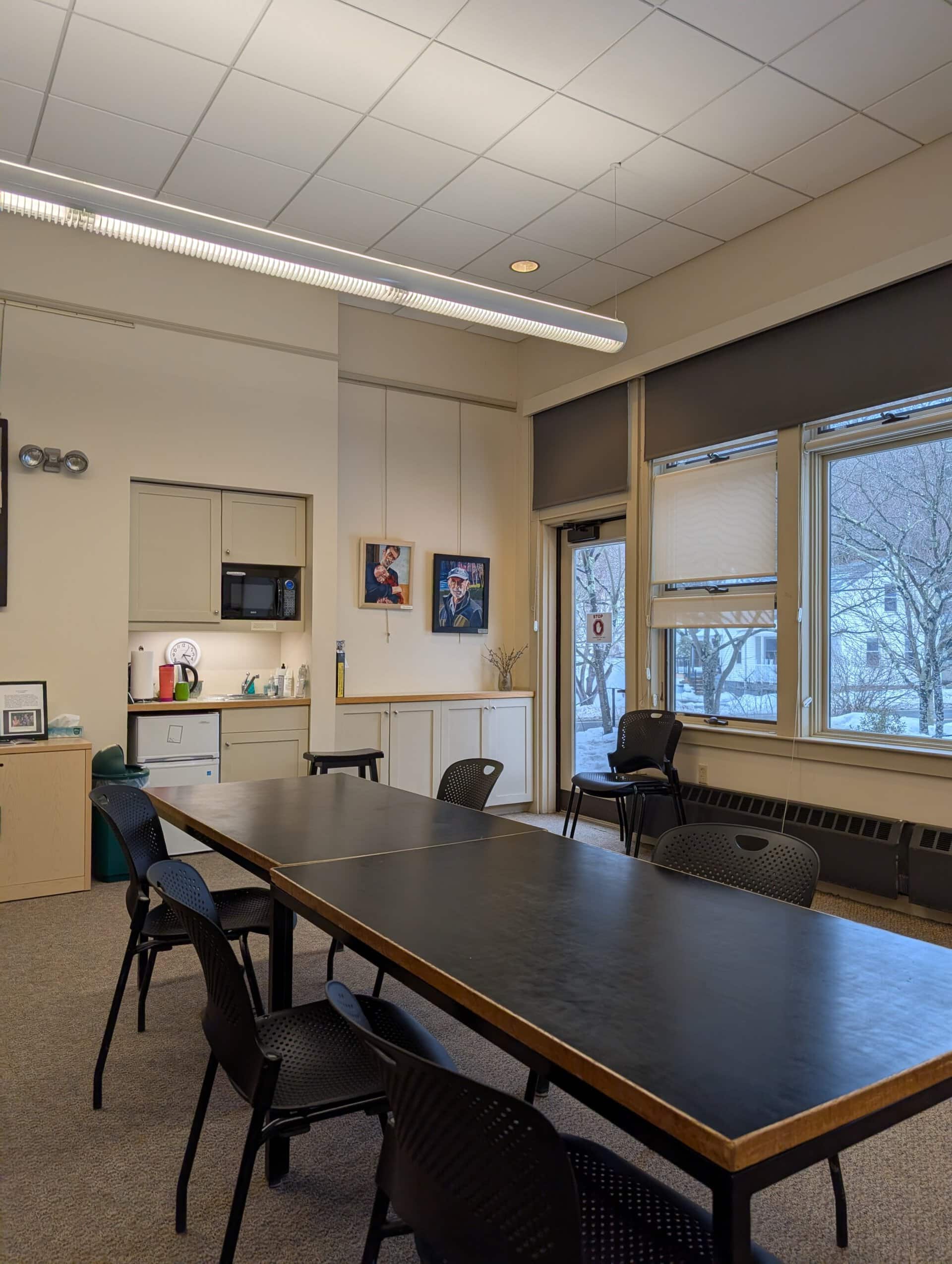 The community room with tables and chairs.