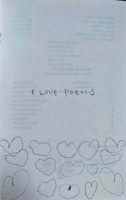 a page with faint printed text, handwritten words "i love poems," and several hand drawn heart shapes at the bottom.