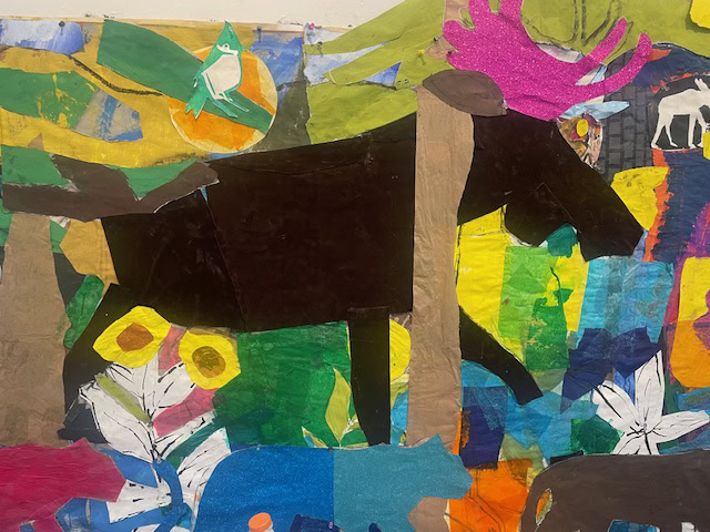 a colorful collage features a large black animal, likely a cow, with vibrant abstract shapes, flowers, and other animals in the background.