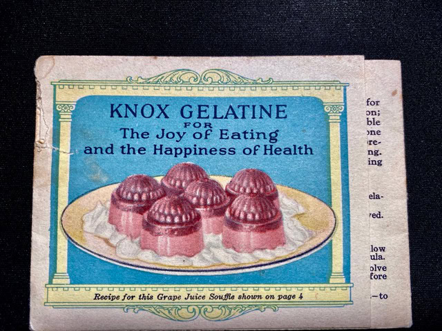 a vintage knox gelatine advertisement featuring six molded grape juice gelatin desserts on a plate with a slogan about the joy of eating and health benefits.