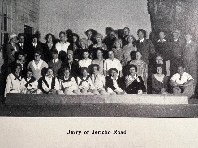 a black and white group photo of men, women, and children posing in rows; caption reads "jerry of jericho road.