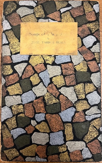 a book titled "songs of a wanderer" by jesse tarbox beals, with a cover featuring a mosaic pattern of multicolored stones.