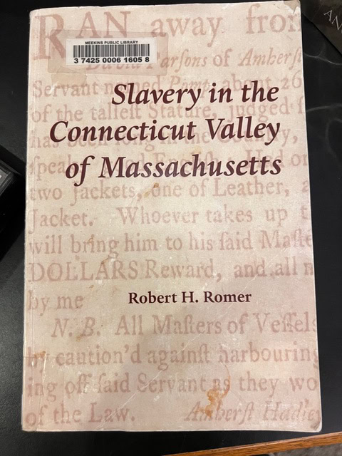 cover of the book "slavery in the connecticut valley of massachusetts" by robert h. romer, featuring faded historical text in the background.