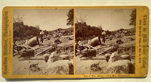 a man stands amid debris and scattered machinery at the site of wm. skinner's silk mill after the 1874 mill river flood in skinnerville.