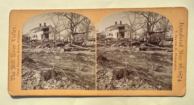 stereoscopic photo of a damaged house and debris in the mill river valley after a flood, dated may 16, 1874.