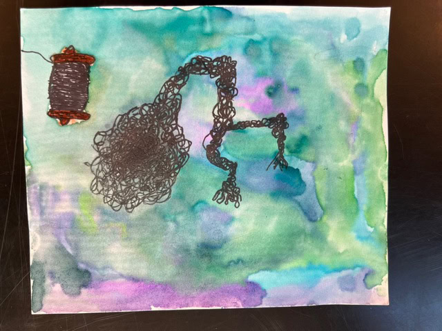 a spool of thread and a tangled black line are drawn over a blue and green watercolor background.