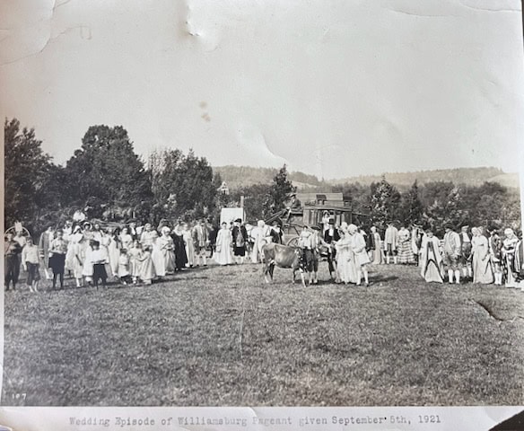 large group of people in early 20th century attire gathered outdoors with trees and a building in the background, labeled as the williamsburg pageant on september 5, 1921.
